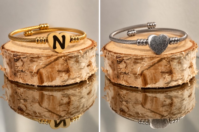 Nieuwe armband met hartje, in goud en zilver